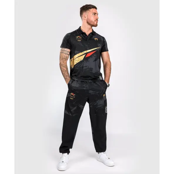 Polo Venum X Mirage Negro/Oro