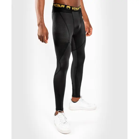 Spats Venum G-Fit - Negro/Oro