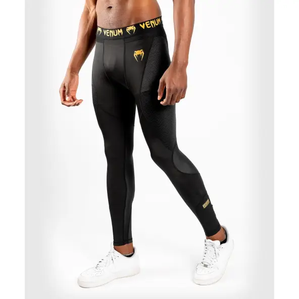Spats Venum G-Fit - Negro/Oro